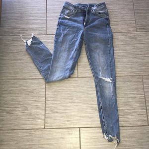 Distressed Light Wash Denim Jeans